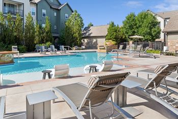 Resort-style pool with aqua sun ledge